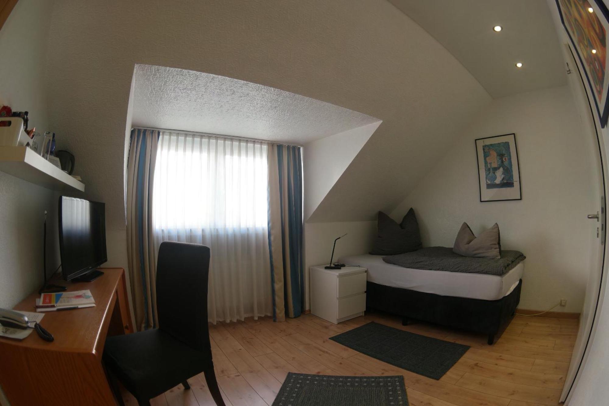 Hotel Merlin Garni 쾰른 객실 사진